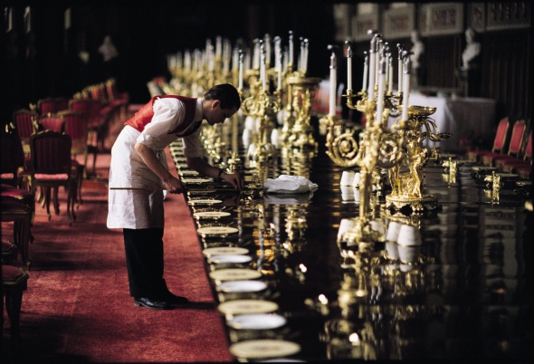 Footman laying places for 200 guests prior to a state banquet in honour of Polish premier Lech Walesa, St George's Hall, Windsor Castle, May 1991